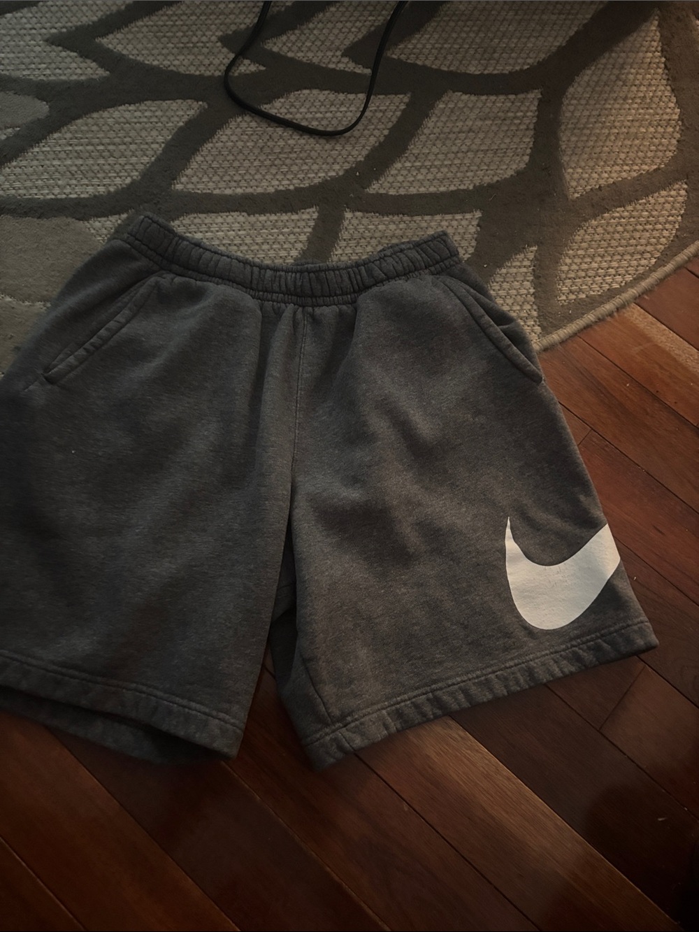 Nike Charcoal Gray Sweat Shorts with White Swoosh